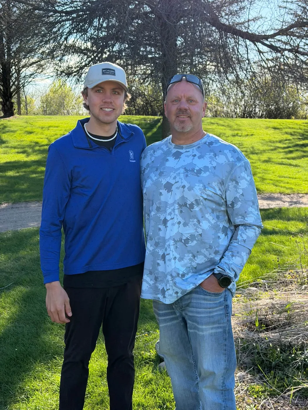 Cory Johnstone of Wyfi Marketing with his dad at a Minnesota golf course